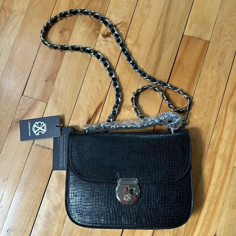 CXL by Christian Lacroix black faux alligator texture woven chain crossbody bag.
